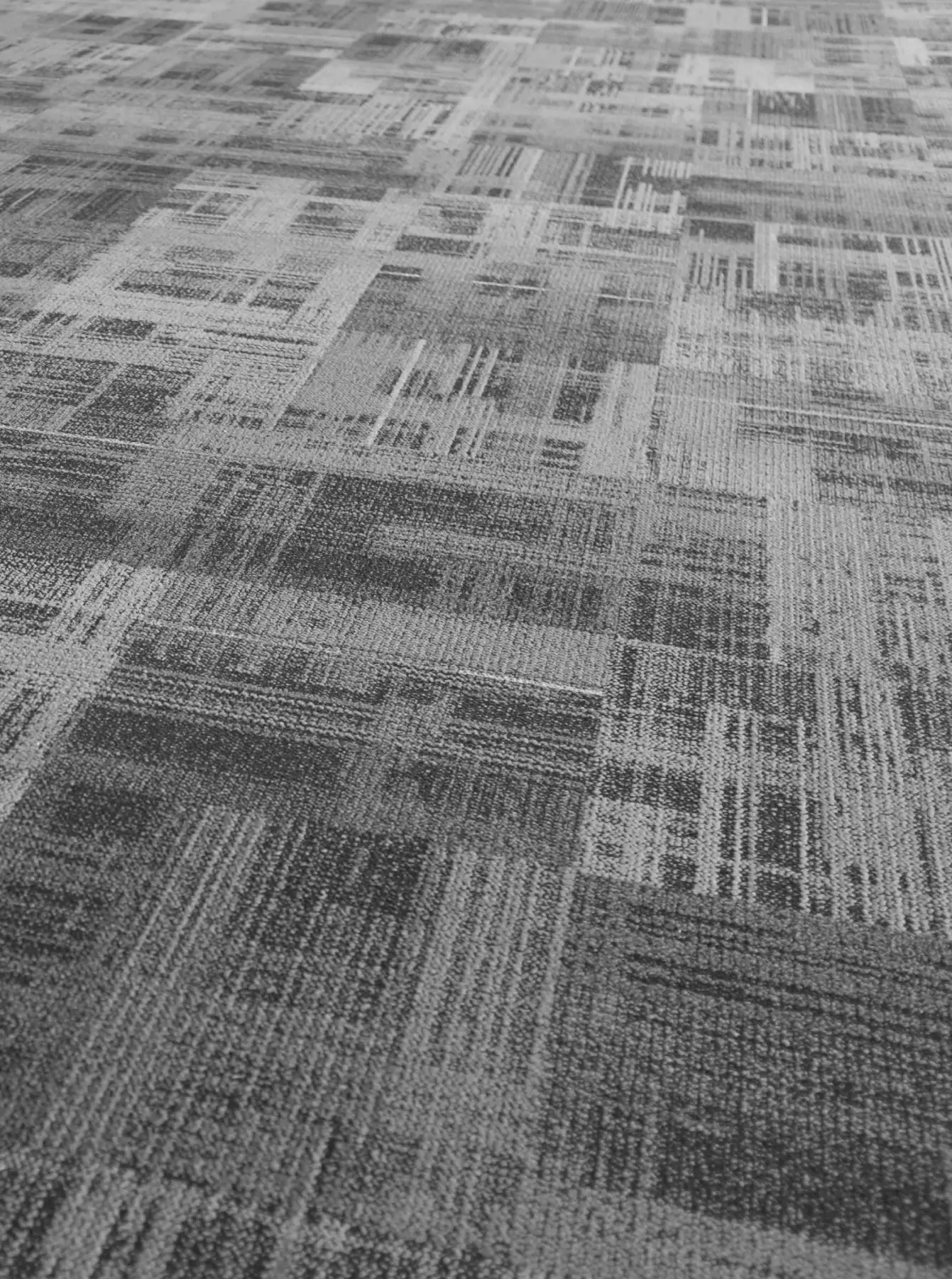 Teppichfliesen professionell verlegen lassen in Neumünster